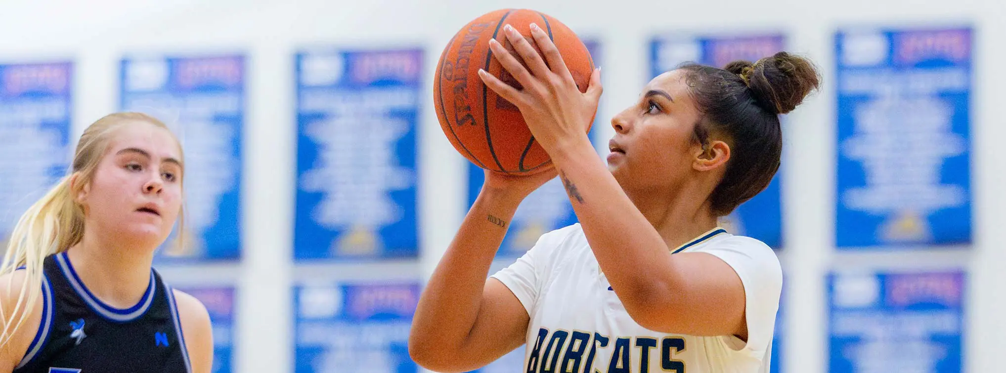 Fans posing with the mascot